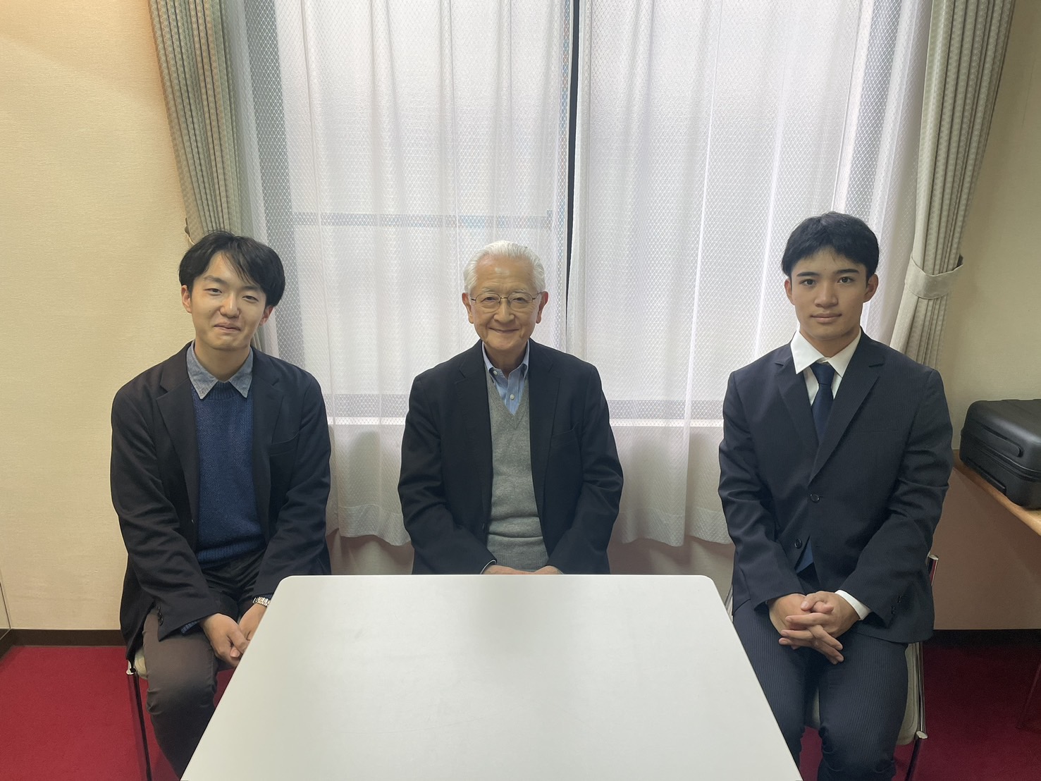 秋山先生と総務及び学生指揮者